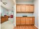 Built-in wooden cabinets in the hallway at 9849 E Amenity Dr, Sun Lakes, AZ 85248