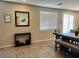 Dining room with a large table, bench seating, and a mirror at 123 S Siena Ln, Casa Grande, AZ 85122