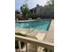 Inviting community pool with plenty of lounge chairs at 15050 N Thompson Peak Pkwy # 1062, Scottsdale, AZ 85260