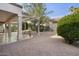 Landscaped backyard with gravel and a pergola at 15744 W Clear Canyon Dr, Surprise, AZ 85374