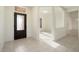 Entryway with tile flooring and view to the living area at 15744 W Clear Canyon Dr, Surprise, AZ 85374