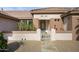 Inviting home exterior with landscaped yard and walkway at 15744 W Clear Canyon Dr, Surprise, AZ 85374