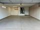 Spacious garage with built-in cabinets and epoxy floor at 15744 W Clear Canyon Dr, Surprise, AZ 85374