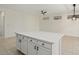 Open kitchen with island and view into adjacent dining area at 15744 W Clear Canyon Dr, Surprise, AZ 85374
