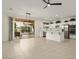 Eat-in kitchen with island, stainless steel appliances, and backyard view at 15744 W Clear Canyon Dr, Surprise, AZ 85374