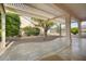 Covered patio with flagstone and pergola at 15744 W Clear Canyon Dr, Surprise, AZ 85374
