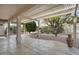 Covered patio with flagstone and pergola at 15744 W Clear Canyon Dr, Surprise, AZ 85374
