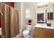 Ensuite bathroom with shower/tub combo and a vanity at 17346 W Alder Ln, Surprise, AZ 85387