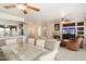 Open concept dining area with kitchen and living room views at 17346 W Alder Ln, Surprise, AZ 85387