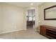Bright foyer with view of living room and tile flooring at 17346 W Alder Ln, Surprise, AZ 85387
