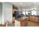 Spacious kitchen with center island and stainless steel appliances at 17346 W Alder Ln, Surprise, AZ 85387