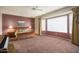 Spacious main bedroom with ample natural light and room for a piano at 17346 W Alder Ln, Surprise, AZ 85387