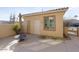 Private backyard patio with a storage shed and seating area at 17346 W Alder Ln, Surprise, AZ 85387