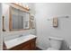 Clean bathroom with single sink vanity, shower, and updated fixtures at 17416 E Oro Grande Dr, Fountain Hills, AZ 85268