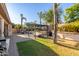 Backyard with pergola, dining area, and grassy lawn at 2410 W Night Owl Ln, Phoenix, AZ 85085