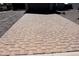 Neat paved driveway with brick pavers leading to garage at 26165 W Desert Crest St, Casa Grande, AZ 85193