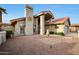 Front view of a two-story house with a two-car garage at 26609 S Howard Dr, Sun Lakes, AZ 85248