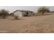 Large backyard with gravel and desert plants at 30138 W Roosevelt St, Buckeye, AZ 85396