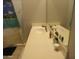 Bathroom vanity with a double sink and mirror at 30138 W Roosevelt St, Buckeye, AZ 85396