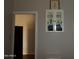 Bathroom with a medicine cabinet and view of another room at 30138 W Roosevelt St, Buckeye, AZ 85396