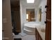 Bathroom boasts a large tub, double vanity, and shower at 30138 W Roosevelt St, Buckeye, AZ 85396
