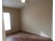 Bedroom with laminate flooring and a ceiling fan at 30138 W Roosevelt St, Buckeye, AZ 85396