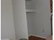 Small bedroom closet with a shelf for storage at 30138 W Roosevelt St, Buckeye, AZ 85396