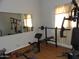 Home gym with weight bench and other exercise equipment at 30138 W Roosevelt St, Buckeye, AZ 85396