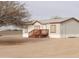 Mobile home with tree and gravel yard at 30138 W Roosevelt St, Buckeye, AZ 85396