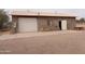 Detached garage with concrete slab and storage area at 30138 W Roosevelt St, Buckeye, AZ 85396