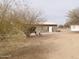 View of detached garage with single door at 30138 W Roosevelt St, Buckeye, AZ 85396
