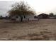 Mobile home exterior with a large yard at 30138 W Roosevelt St, Buckeye, AZ 85396