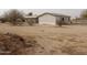 Mobile home exterior with a large yard at 30138 W Roosevelt St, Buckeye, AZ 85396
