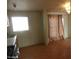 View of kitchen with wood cabinets and laminate floor at 30138 W Roosevelt St, Buckeye, AZ 85396