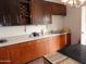 Kitchen boasts extensive cabinetry and granite countertops at 30138 W Roosevelt St, Buckeye, AZ 85396