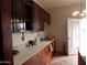 Kitchen with granite countertops and wood cabinets at 30138 W Roosevelt St, Buckeye, AZ 85396