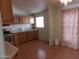Kitchen boasts wood cabinets and a stainless steel range at 30138 W Roosevelt St, Buckeye, AZ 85396