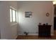 Living room with wood-look floors and an electric fireplace at 30138 W Roosevelt St, Buckeye, AZ 85396