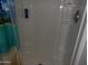Shower stall with tiled walls and built-in shelves at 30138 W Roosevelt St, Buckeye, AZ 85396