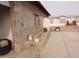 Side yard with gravel, a concrete patio, and plants at 30138 W Roosevelt St, Buckeye, AZ 85396