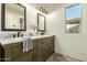 Modern bathroom with double sinks and shiplap walls at 3510 N Los Alamos --, Mesa, AZ 85213