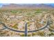 Aerial view of a luxury community with golf course at 4058 S Alamandas Way, Gold Canyon, AZ 85118