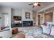 Living area features a fireplace, hardwood floors, and ample natural light at 4058 S Alamandas Way, Gold Canyon, AZ 85118