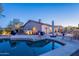 Luxury pool with a spacious patio and mountain views at 4058 S Alamandas Way, Gold Canyon, AZ 85118