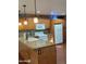 Modern kitchen featuring granite countertops and wood cabinets at 5031 N 81St St, Scottsdale, AZ 85250