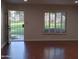 Living room with hardwood floors and view of backyard at 5031 N 81St St, Scottsdale, AZ 85250