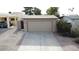 Aerial view of a house with a tan garage and driveway at 5839 E Norwood St, Mesa, AZ 85215