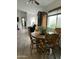 Dining area with wooden table and chairs near the kitchen at 5839 E Norwood St, Mesa, AZ 85215