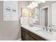 Elegant bathroom boasts dual sinks and modern vanity at 6530 E Libby St, Phoenix, AZ 85054