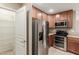 Bright kitchen with stainless steel appliances and pantry at 823 E Dragon Springs Dr, Casa Grande, AZ 85122